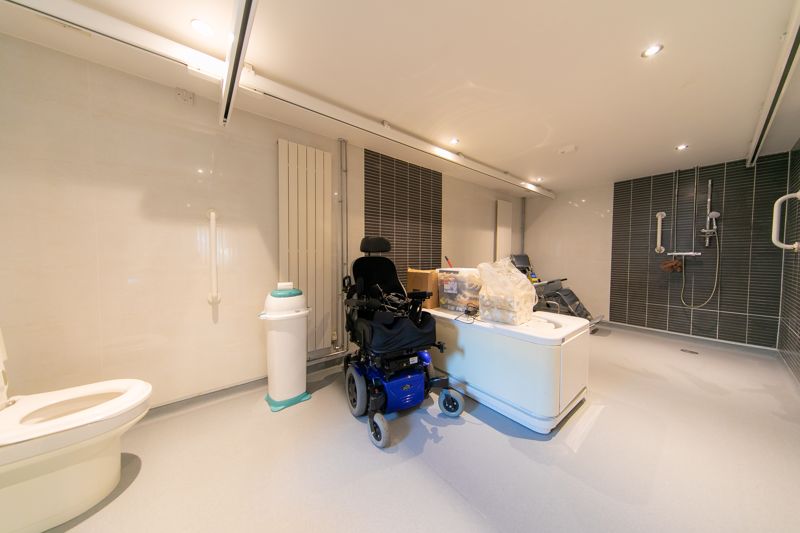 Fully accessible en-suite shower room